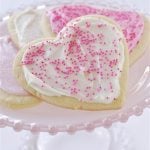 plate of heart shaped sugar cookies