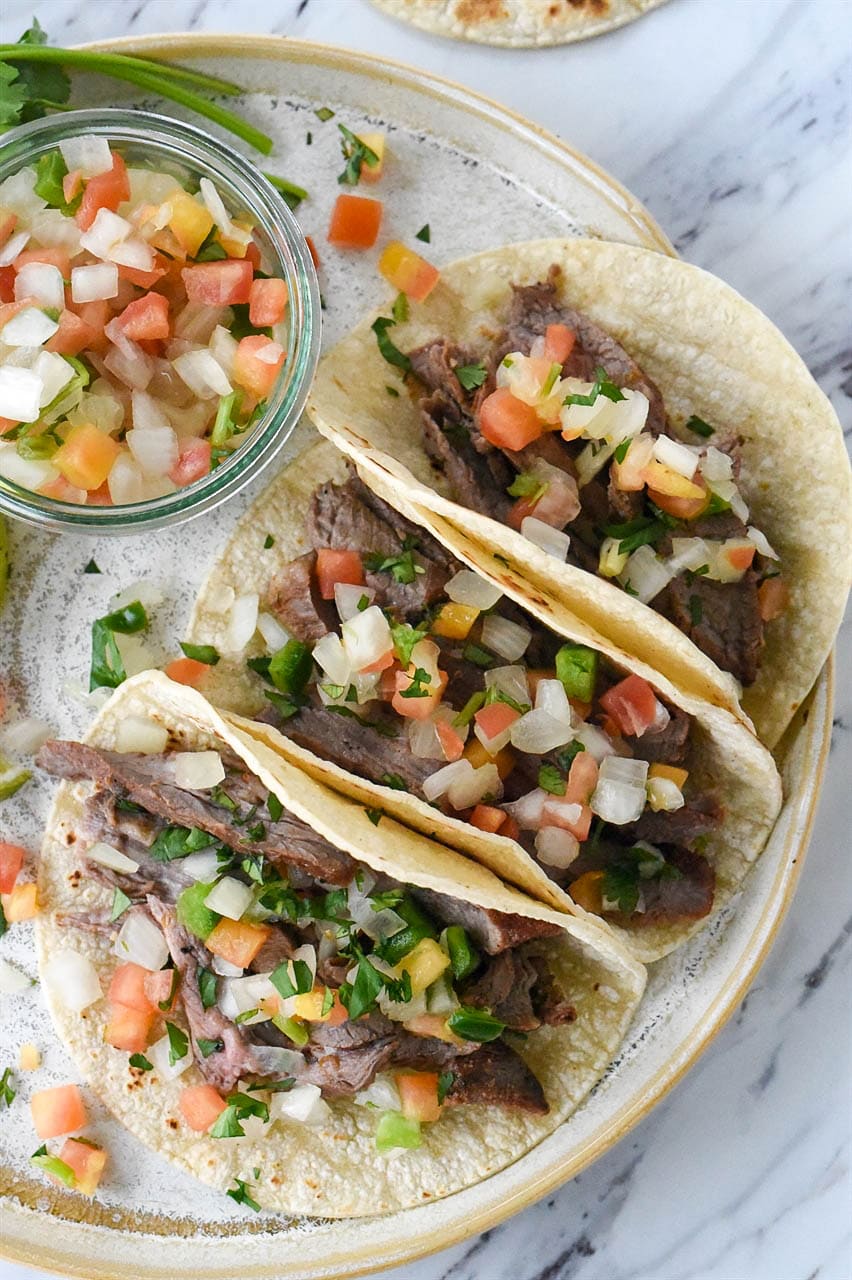 closeup overhead shot of carne asada tacos