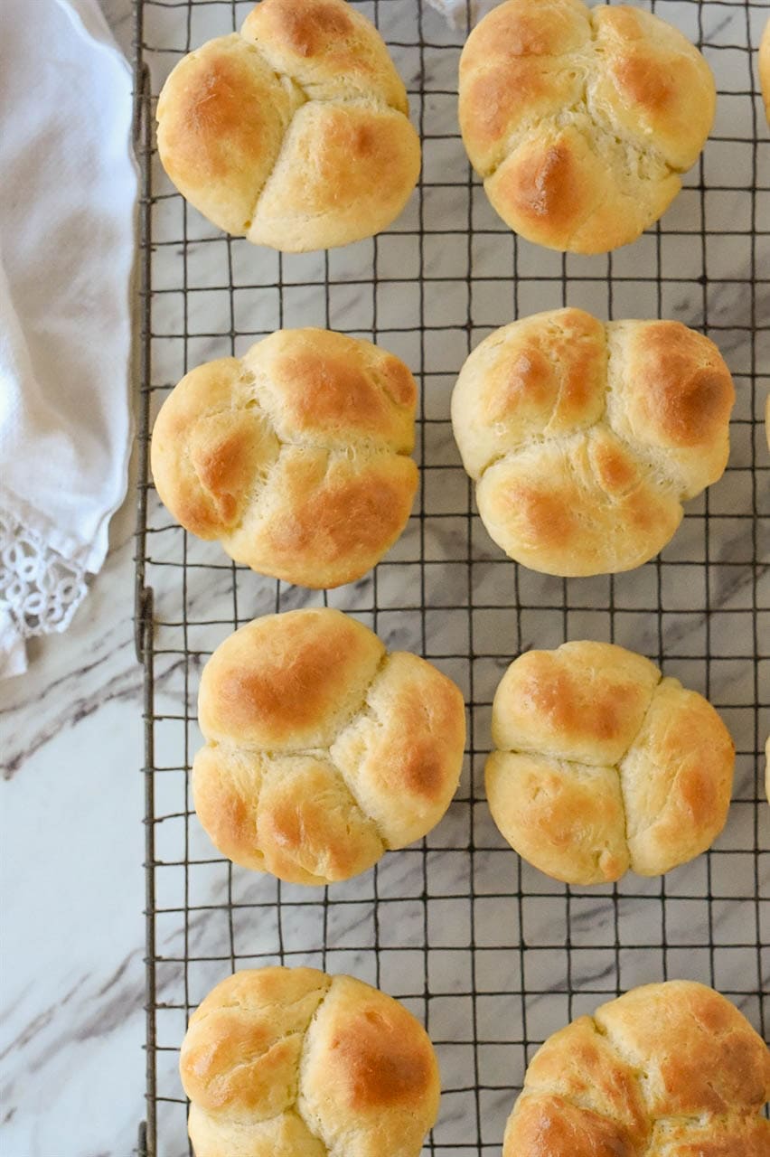 Buttery yeast rolls on a rack