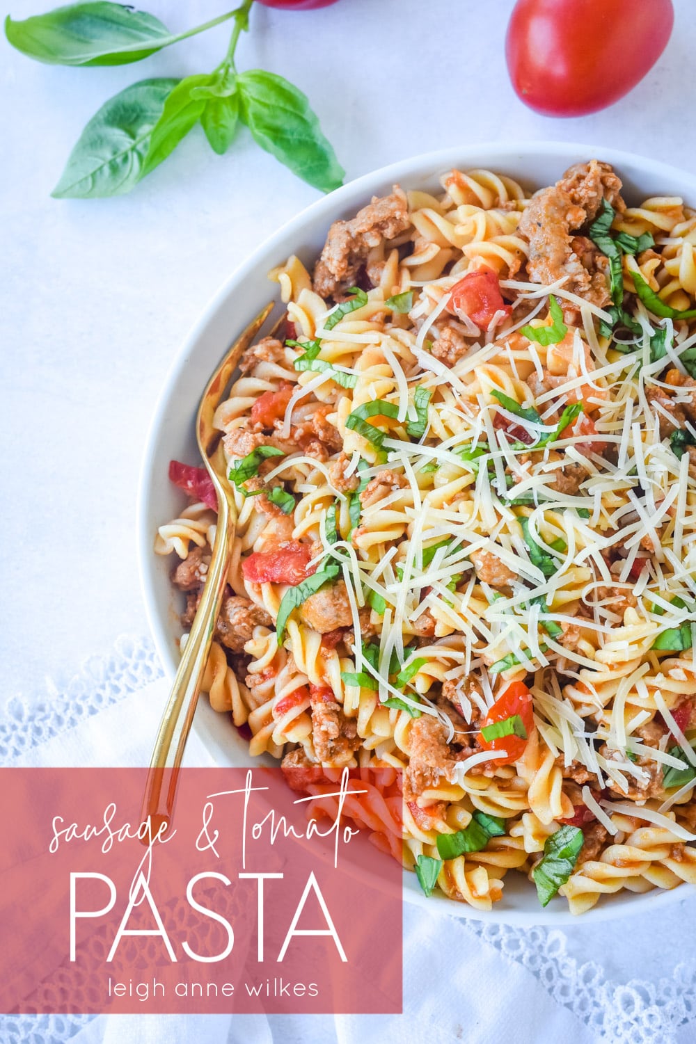 Sausage and Tomato Pasta with Parmesan cheese on top