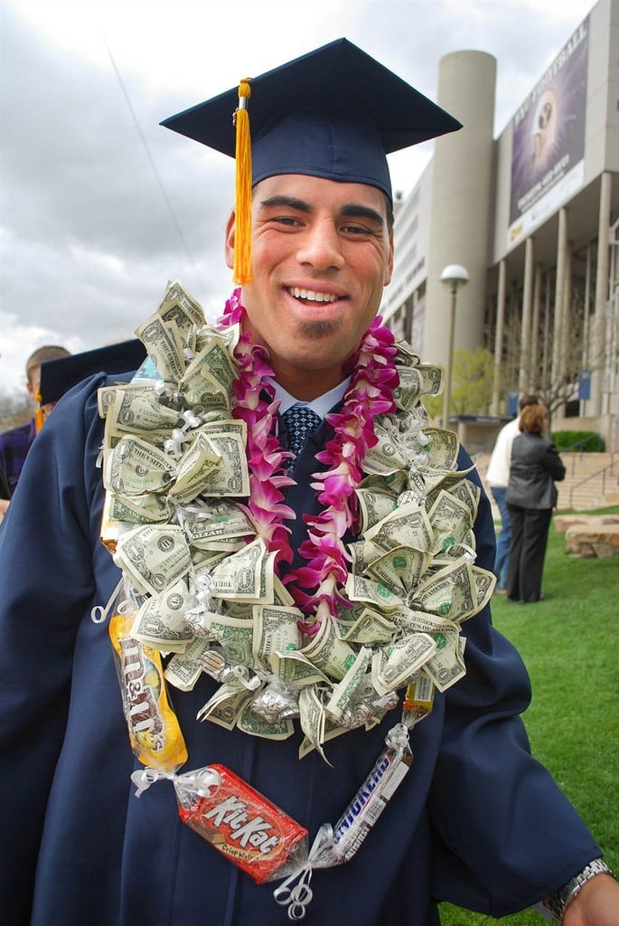graduate wearing a money lei