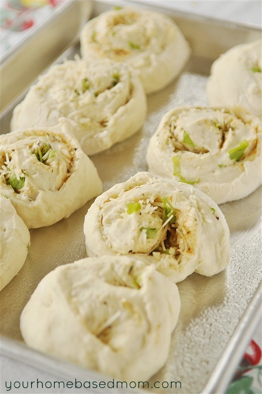 Soft and warm, these homemade rolls combine cheese, garlic and herbs for a delicious side to any meal. 