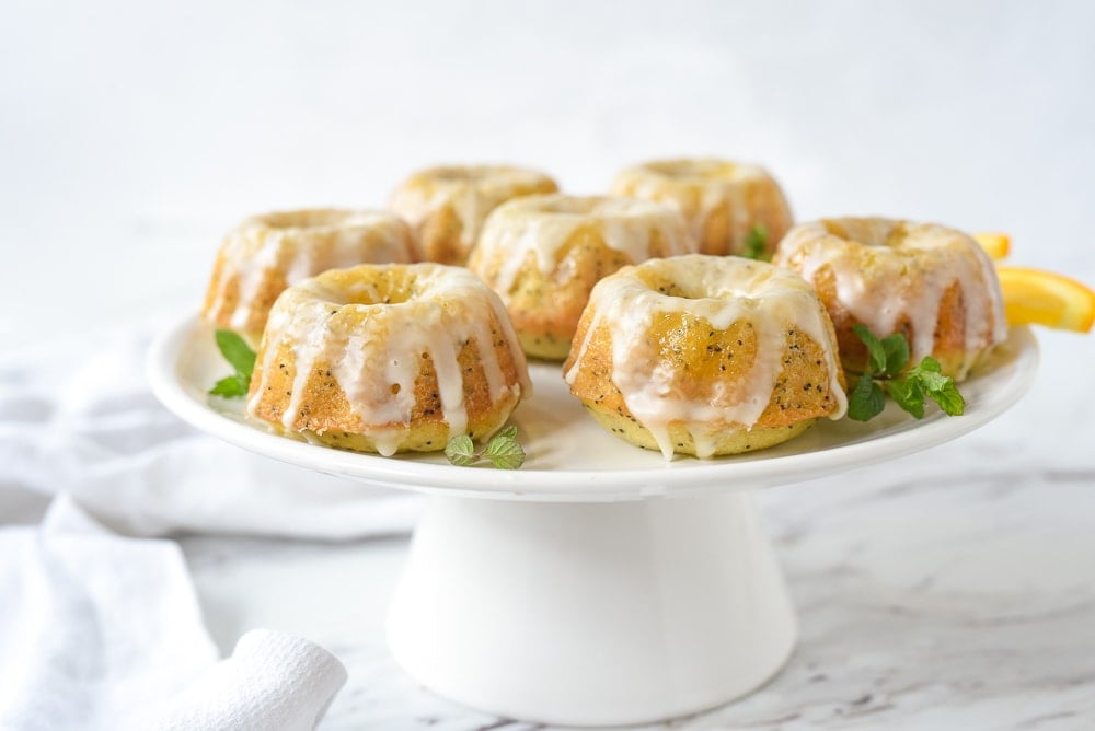 plate of small orange poppy seed bundt cakes