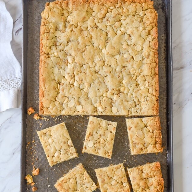 cut squares of blondies on a baking sheet