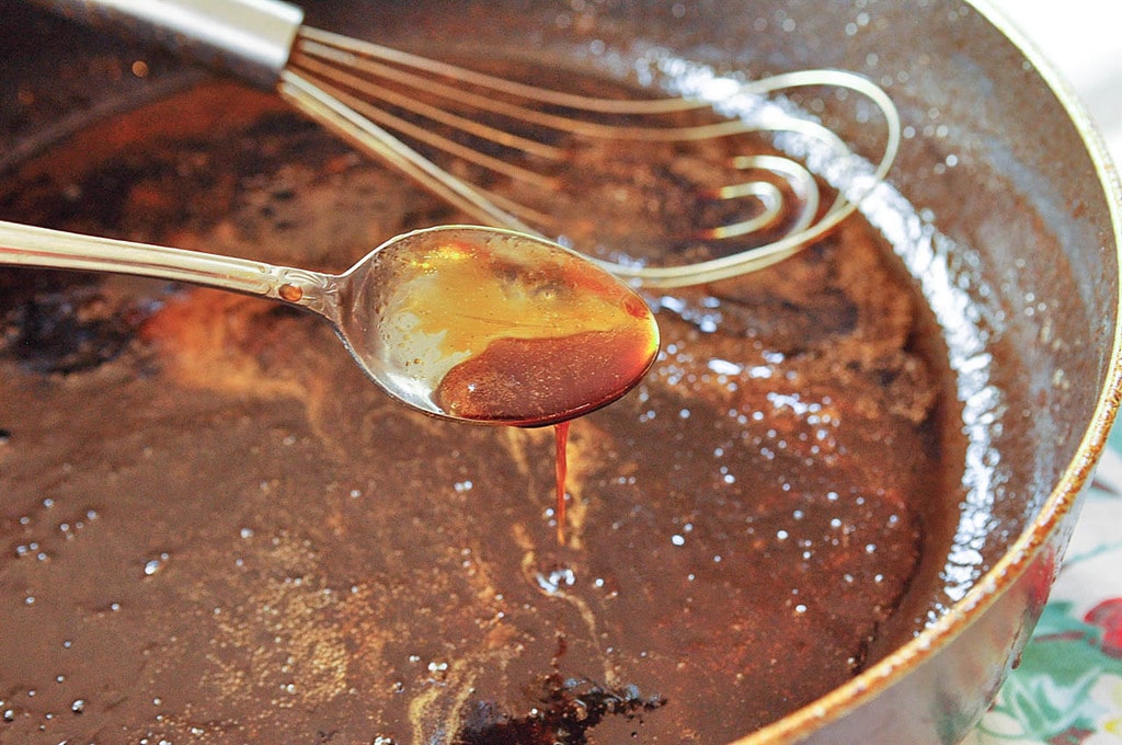 thickened sesame chicken sauce on spoon