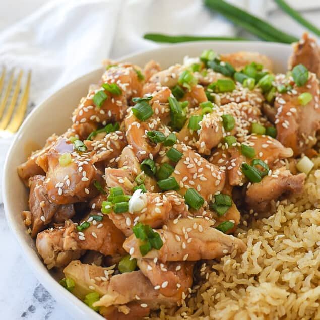 closeup of sesame chicken in a bowl