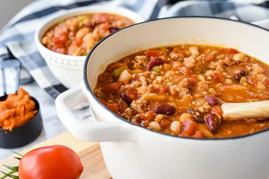 cast iron pot of Pumpkin Chili with ground chicken