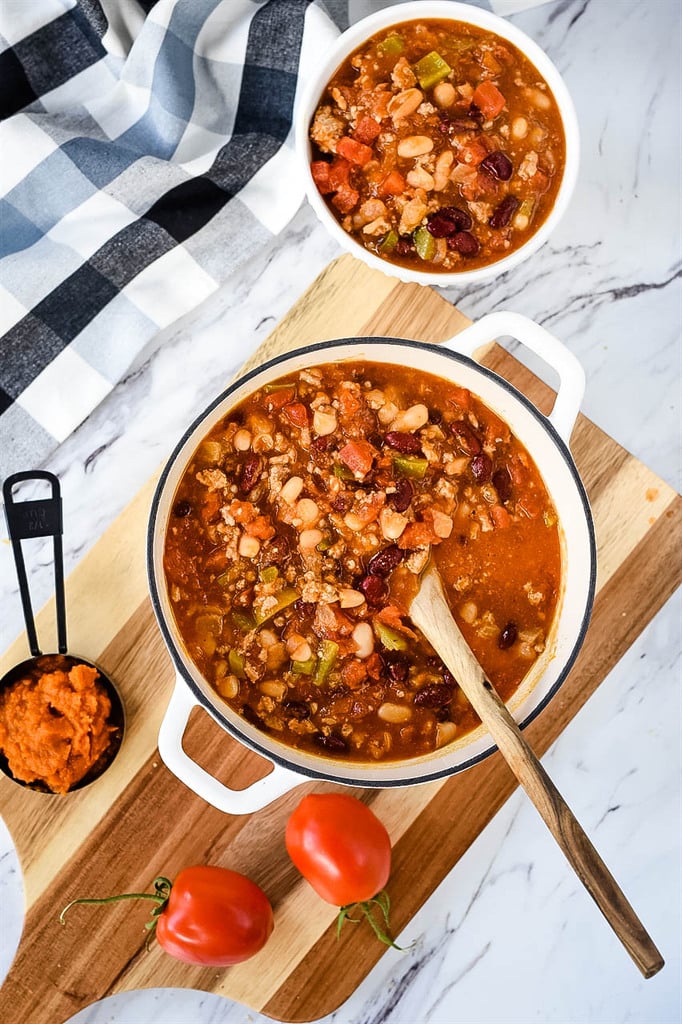 wooden spoon in Pot of Pumpkin Chili