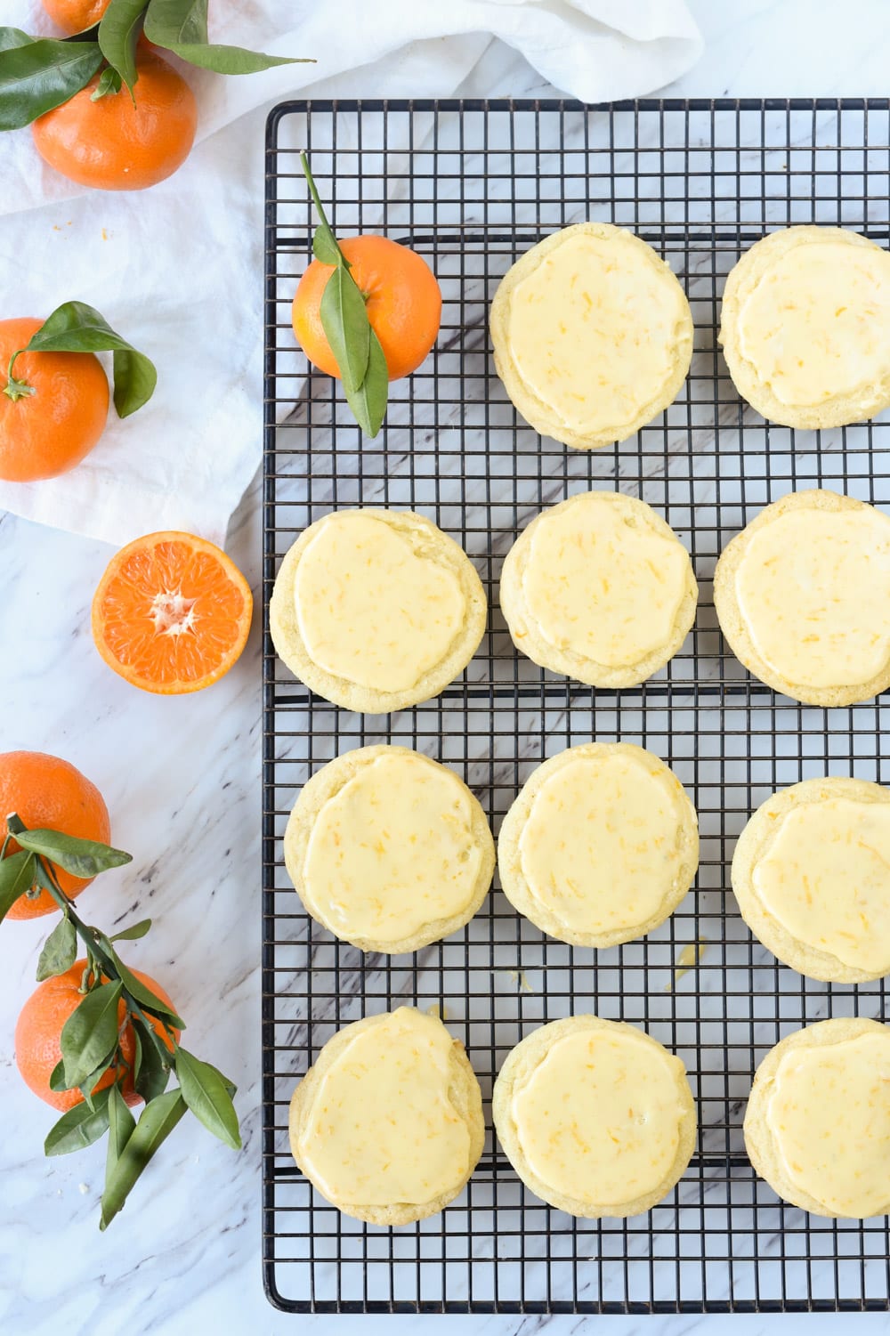 Glazed Orange Cookies on a cooling rack