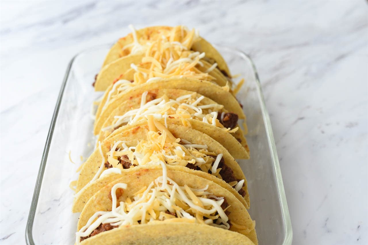 baked tacos with cheese on top
