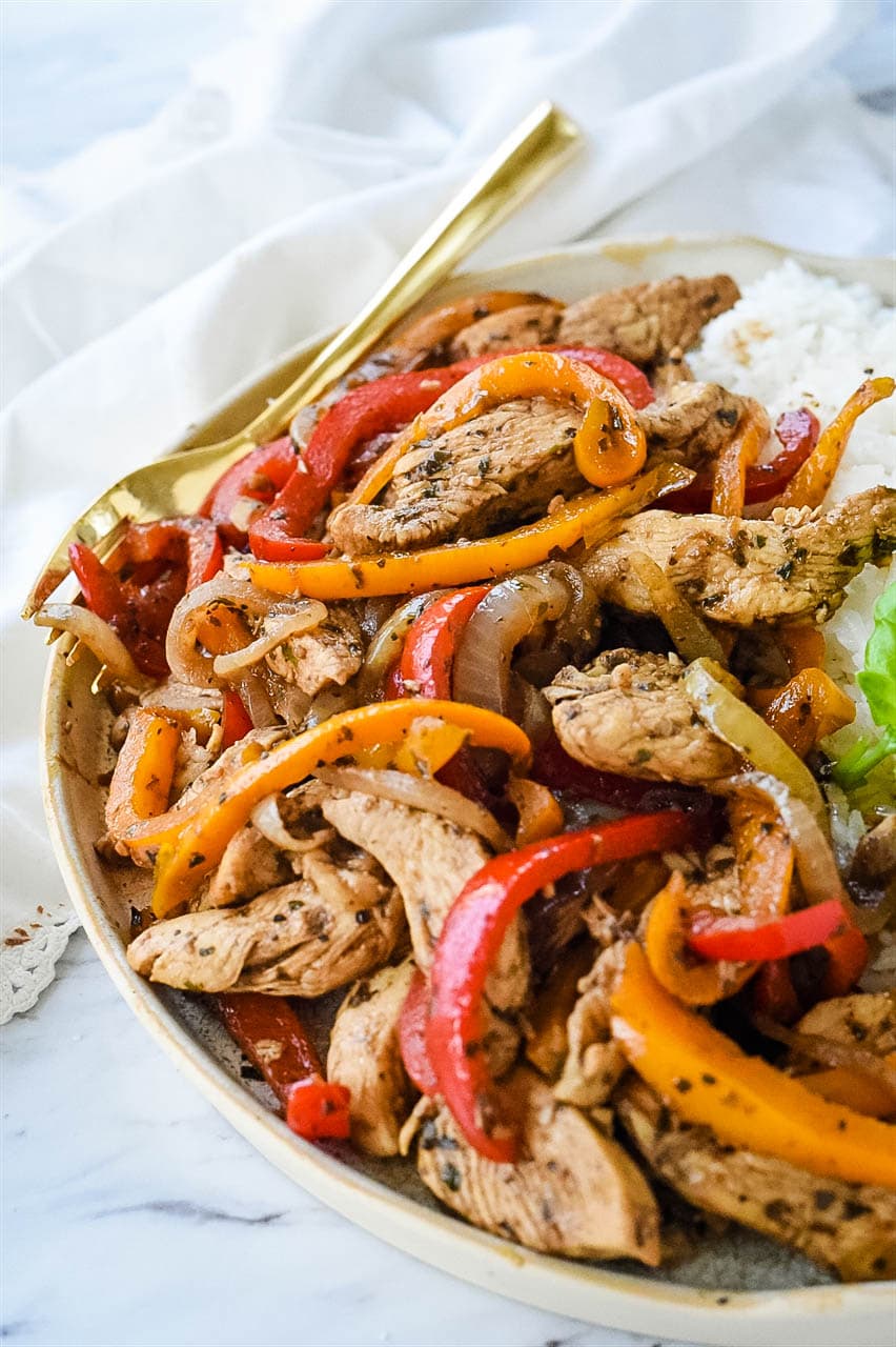 chicken and peppers in a bowl