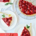 Slices of strawberry cream pie on plates