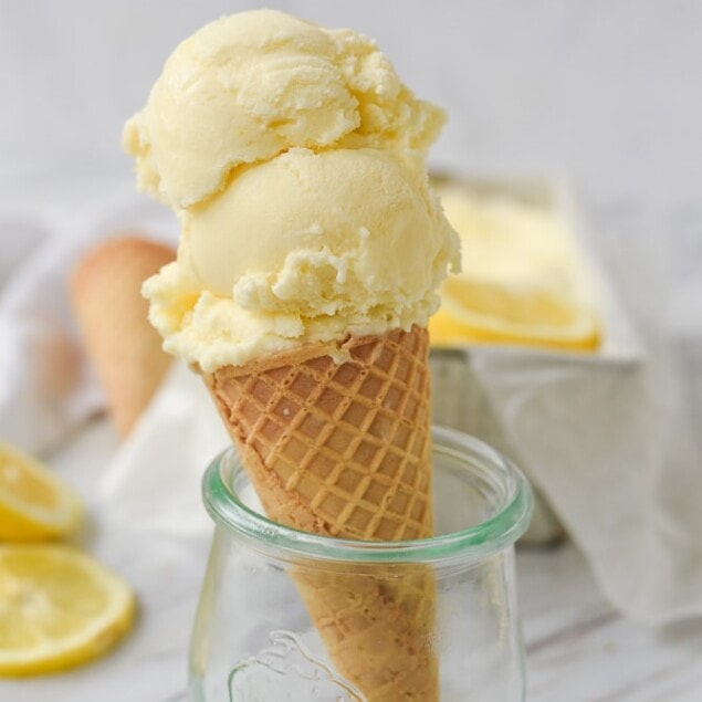 ice cream cone with lemon ice cream scoops