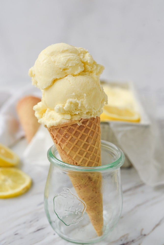 ice cream cone with lemon ice cream scoops