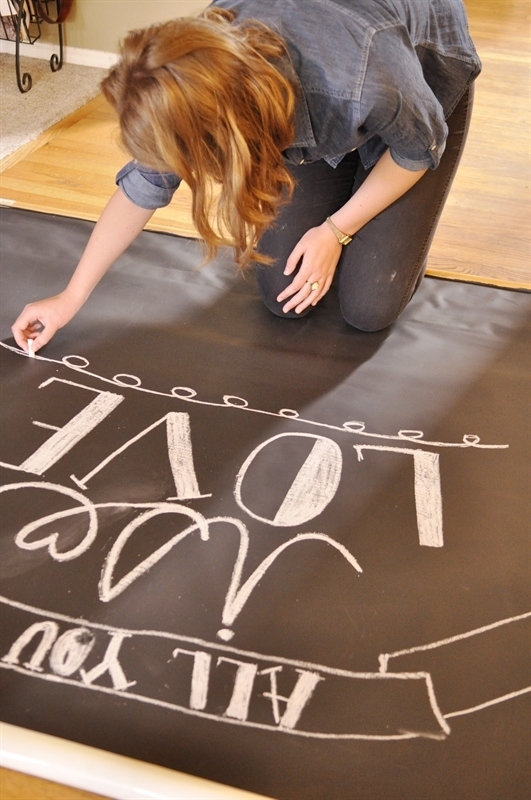 writing with chalk on backdrop