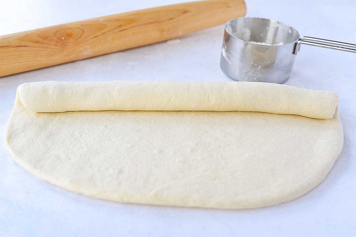 rolling up bread dough