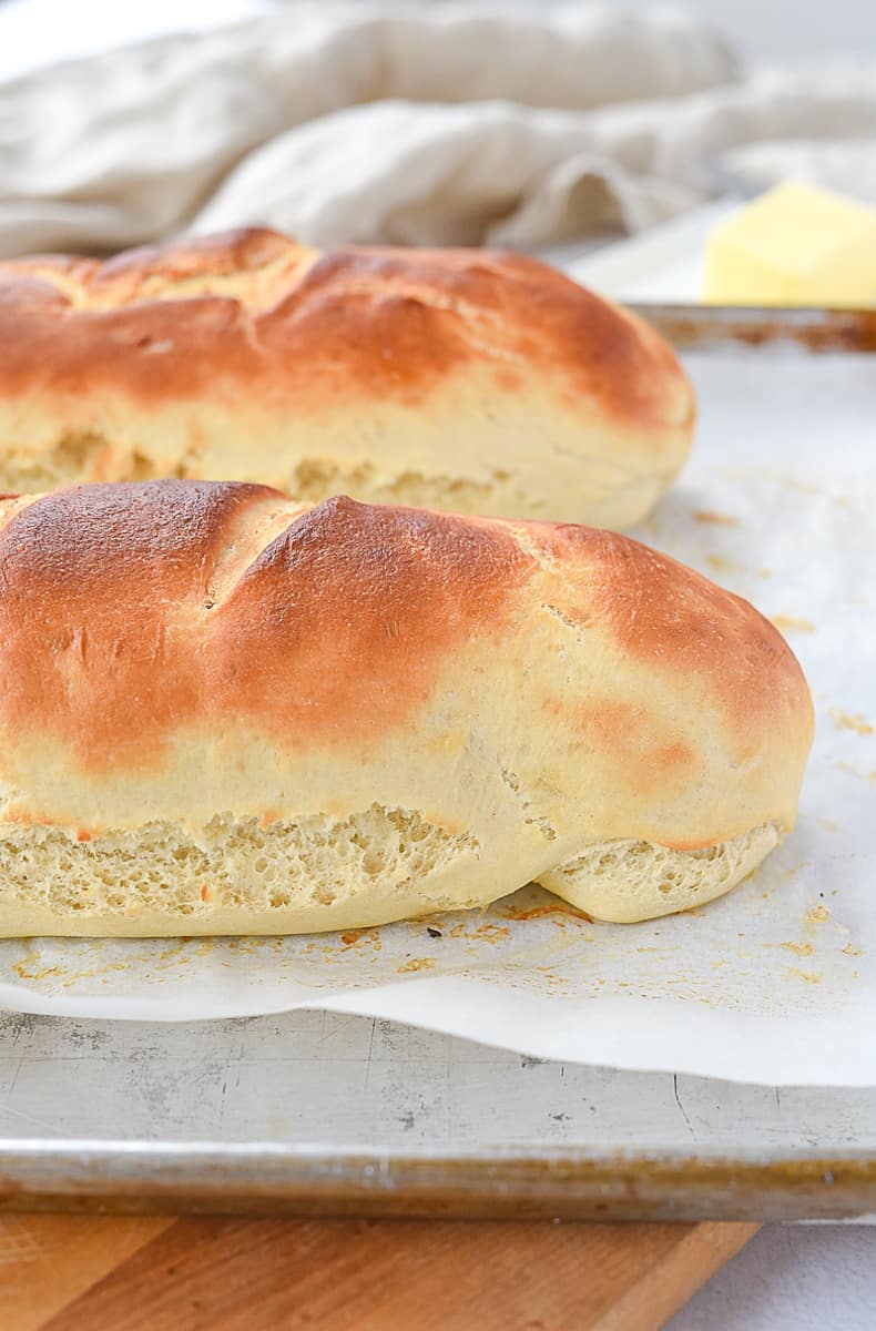 two loaves of bread on a baking sheet