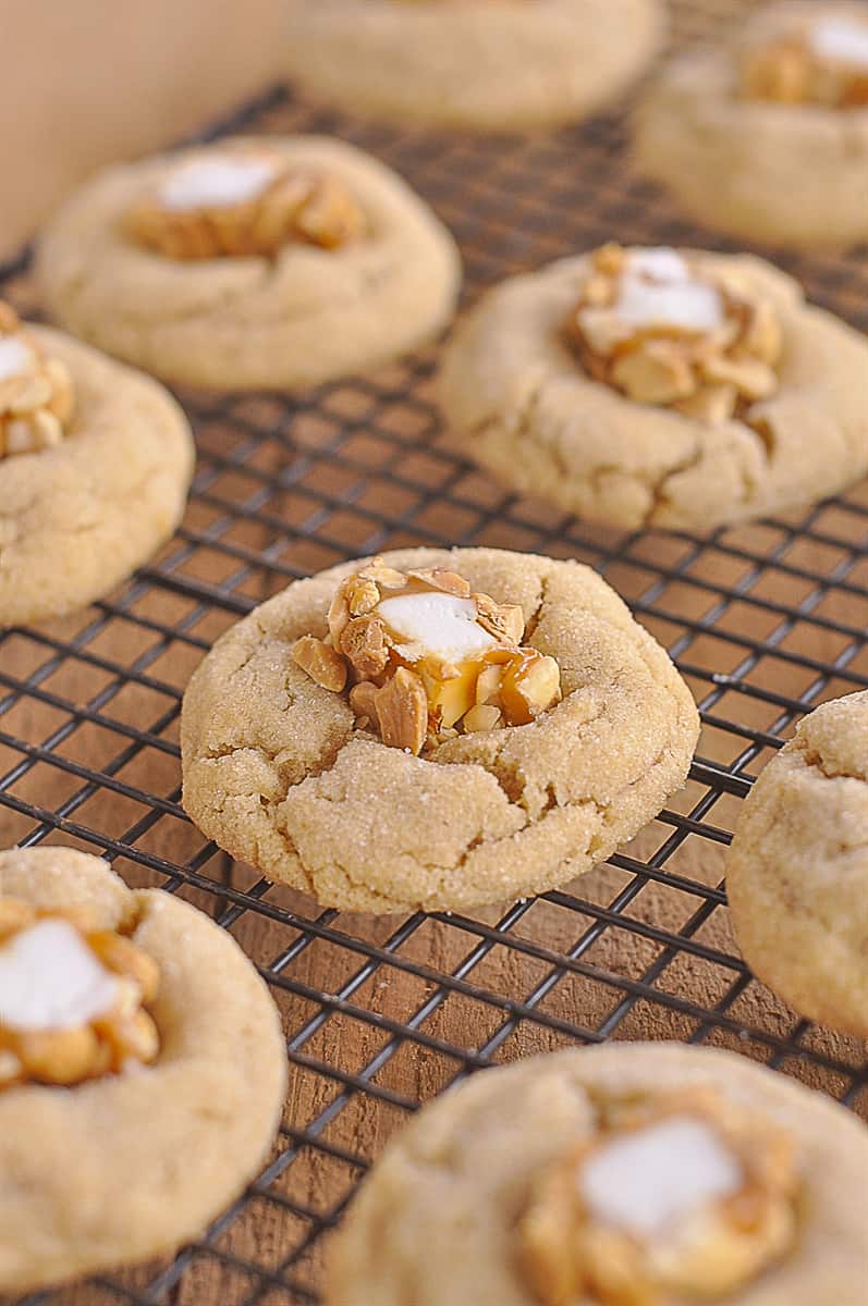 peanut butter blossom cookies on a cooking rack