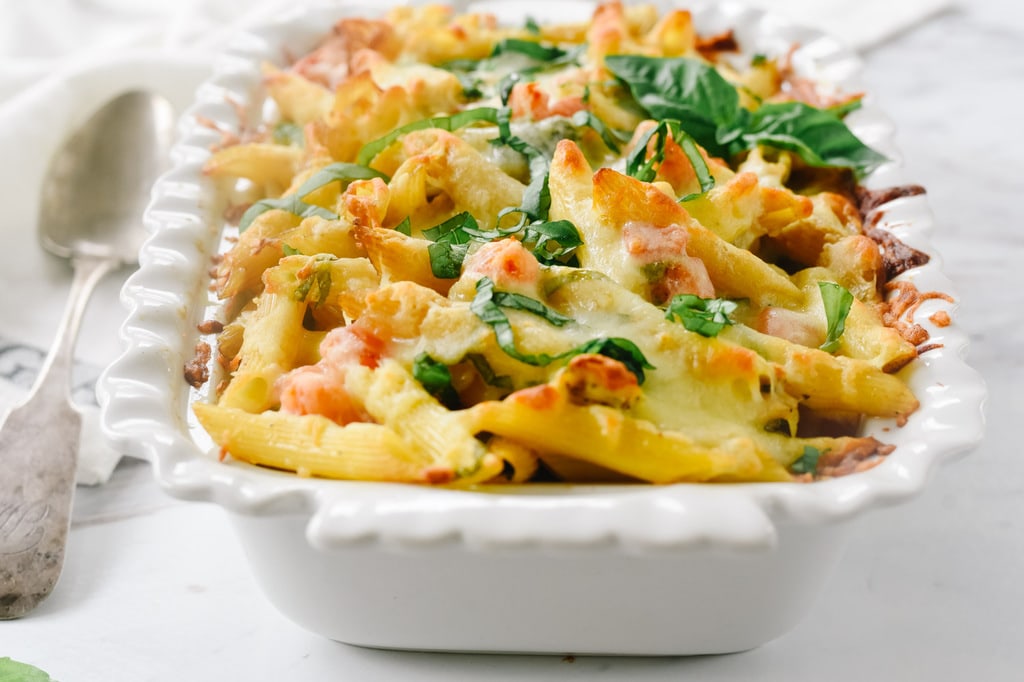 Pesto Chicken Pasta bake in a white casserole