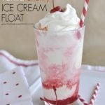 cherry float with whipped cream on top