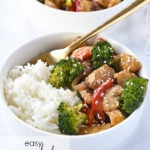 bowl of pepper chicken over rice