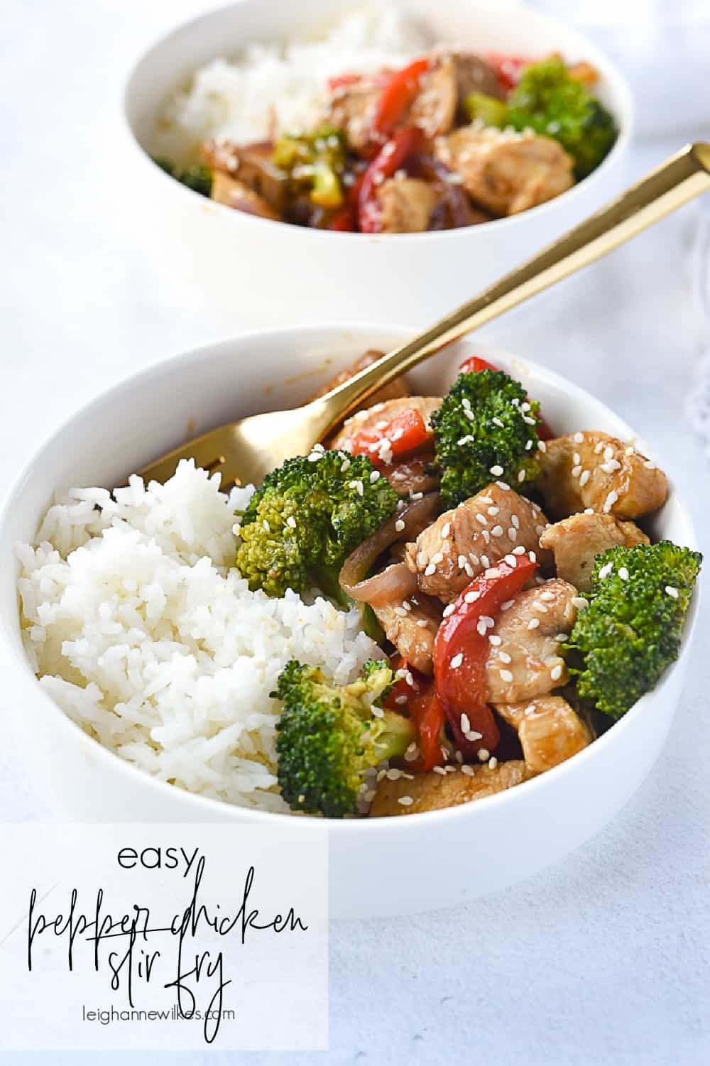 bowl of pepper chicken over rice