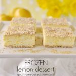 slices of frozen lemon dessert on a cake stand