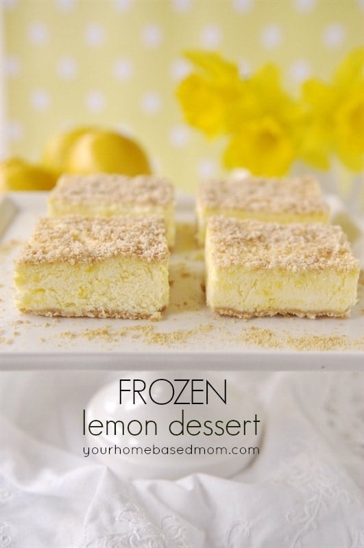 slices of frozen lemon dessert on a cake stand