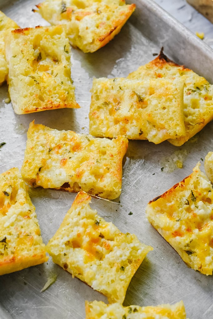 garlic cheese bread on a baking sheet