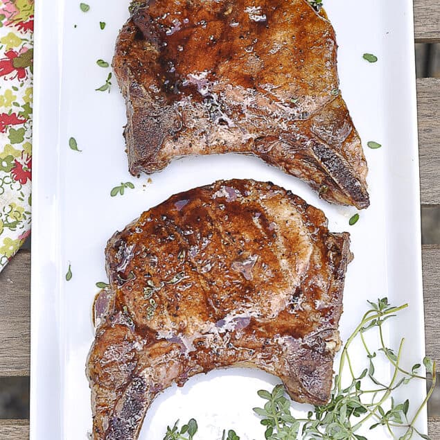 two pork chops on a plate