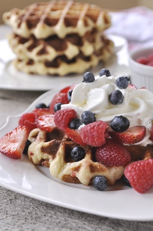 waffle with berries on a palte.