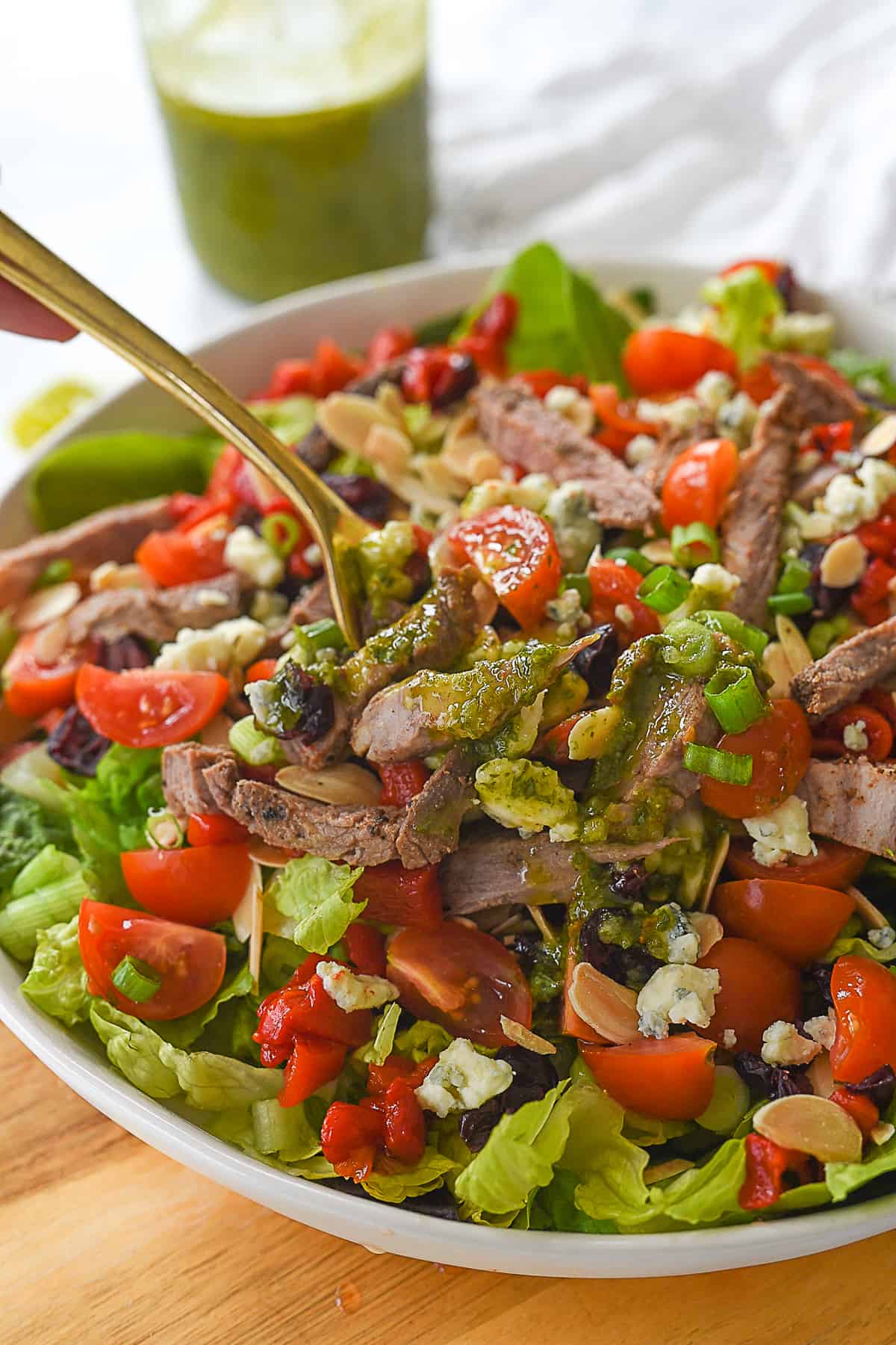 tri tip steak salad in a bowl