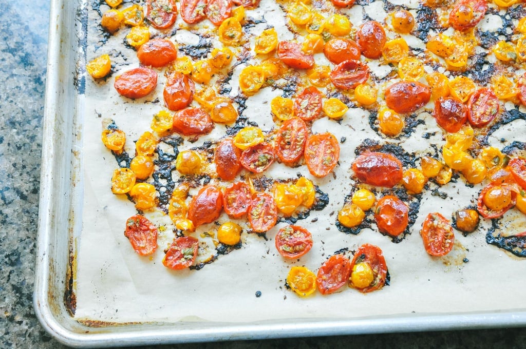 roasted cherry tomatoes on a baking sheet