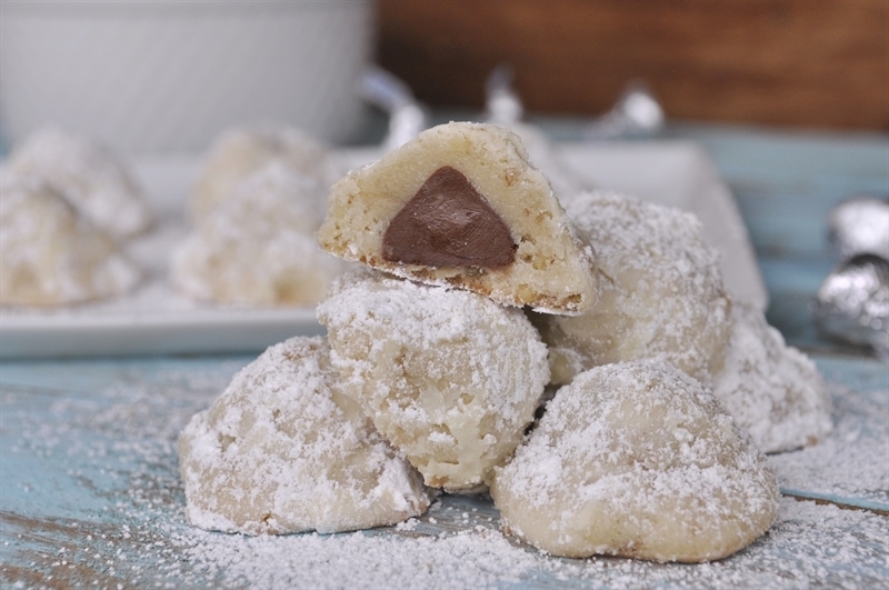 snowball cookie with hidden hershey kiss