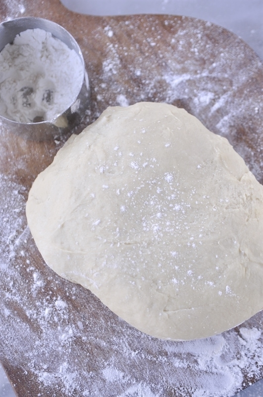Lemon rolls dough on board