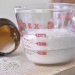 measuring cup with yeast