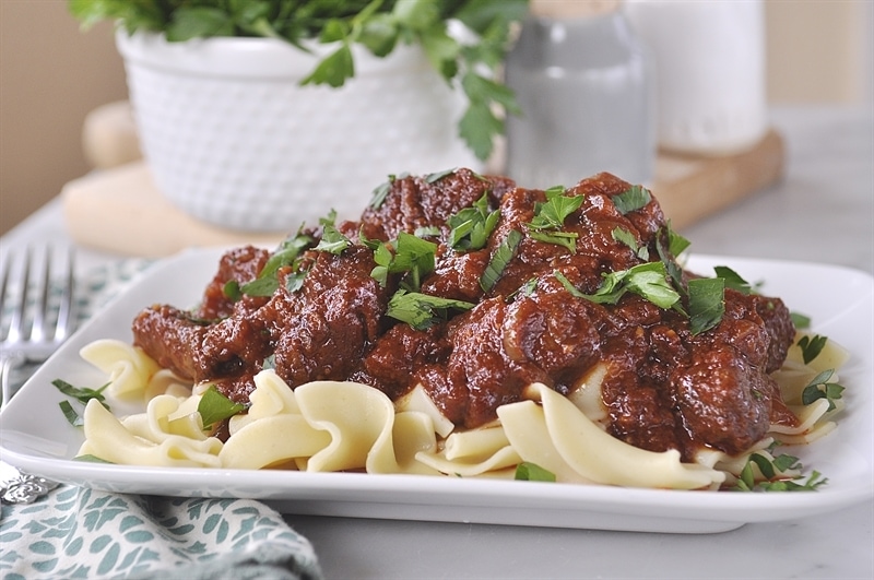 Beef Stroganoff over noodles