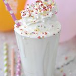 A Birthday Cake Milkshake - the perfect combination, ice cream and cake all in one @yourhomebasedmom.com