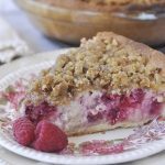 slice of raspberry sour cream pie on a plate