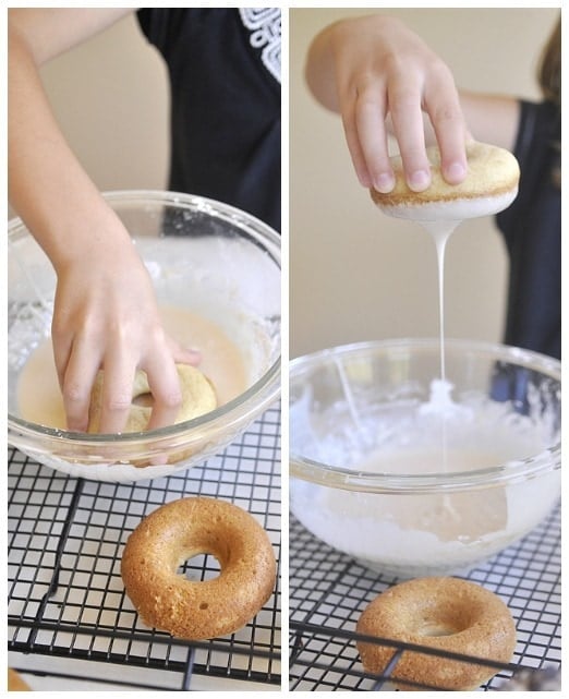 Dipping Baked Donuts into glaze