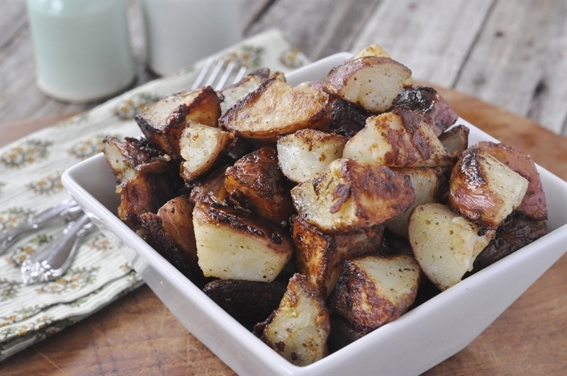 white bowl of roasted potatoes