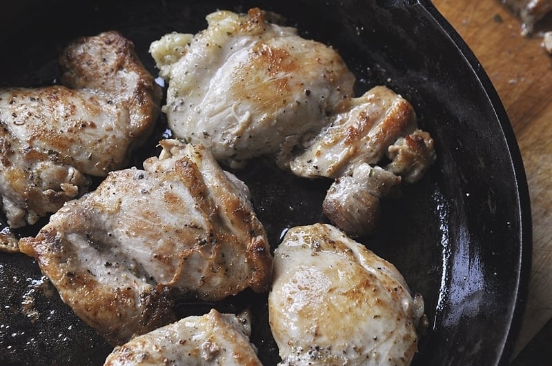 cooking Halal Chicken in a cast iron skillet