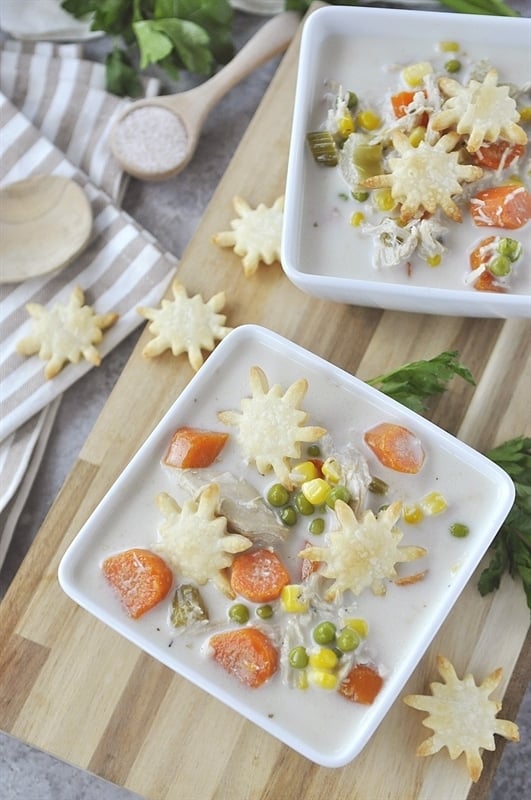 overhead shots of chicken pot pie soup in bowls.