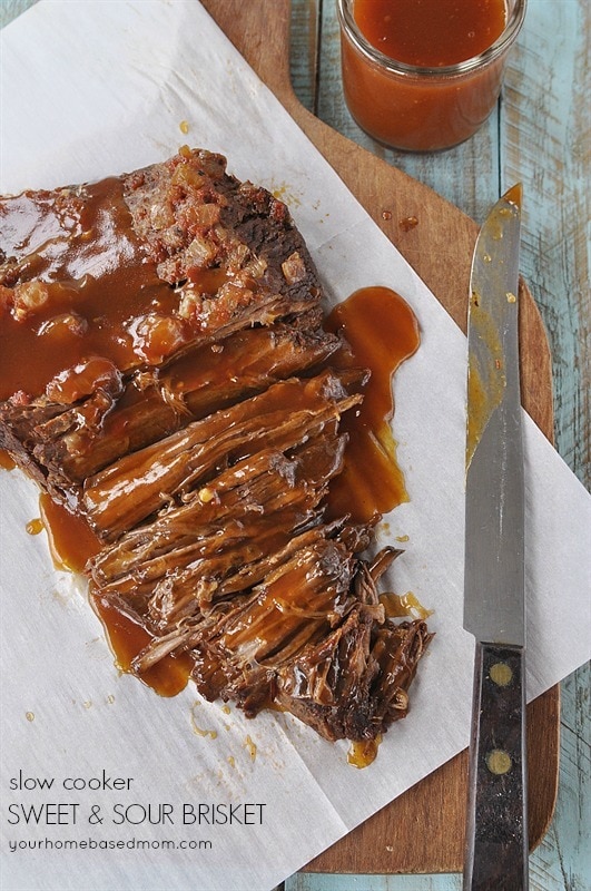 sweet and sour brisket sliced on parchment paper