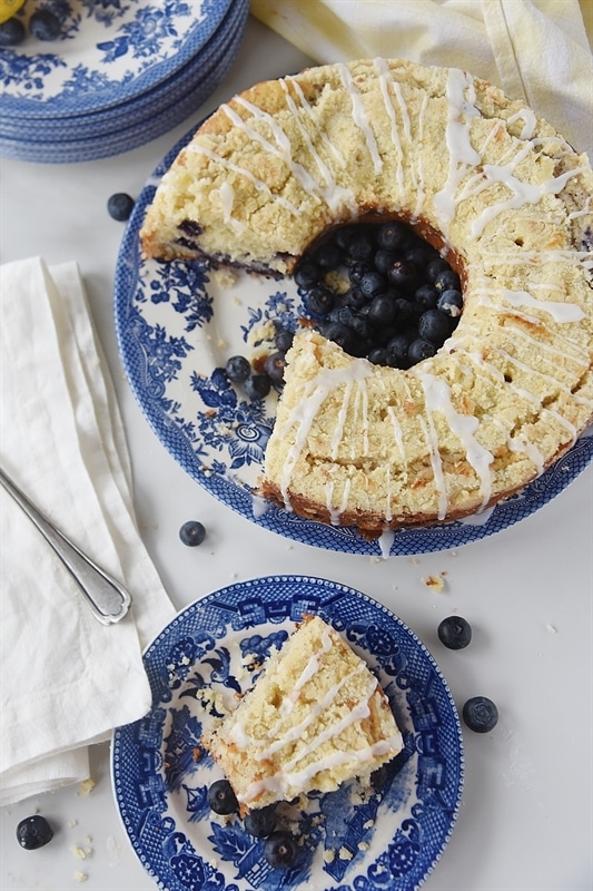 serving a slice of Lemon Blueberry Coffee Cake