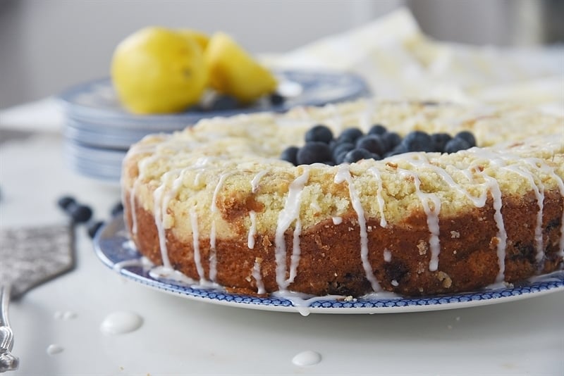 Lemon Blueberry Coffee Cake topped with fresh blueberries and lemon glaze