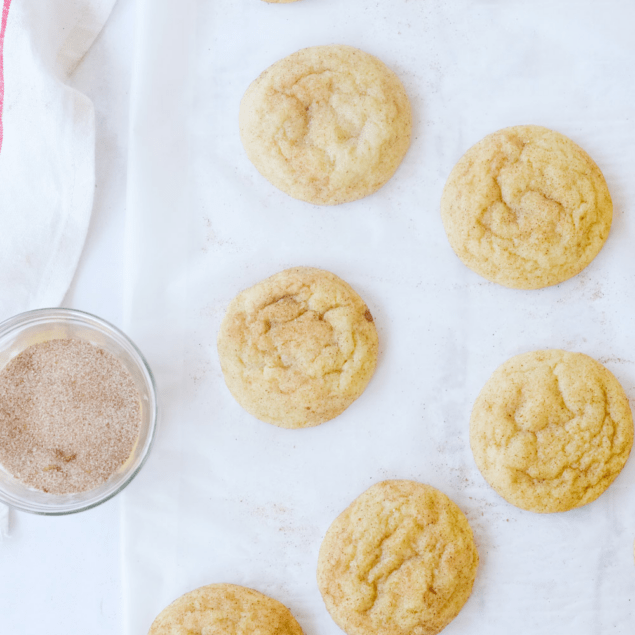 snickerdoodle cookies on parchment paper