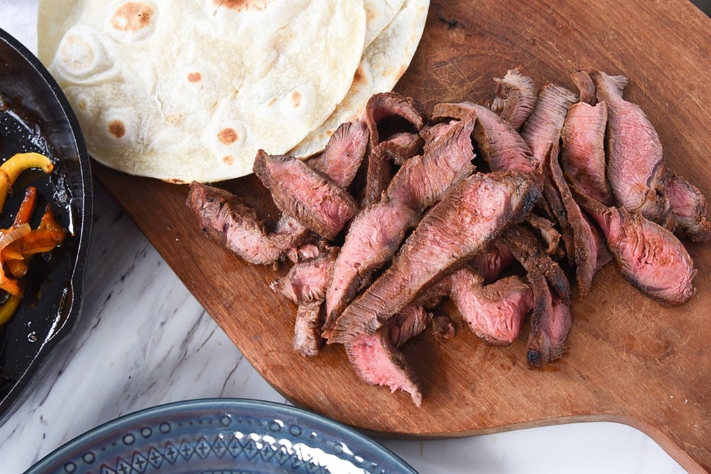 sliced steak for Flat Iron Steak Fajitas