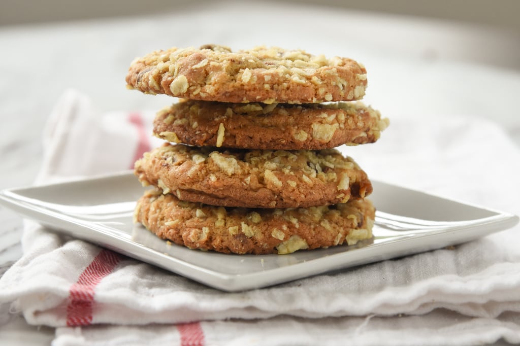 stack of bakery style chocolate chip cookies with potato chips