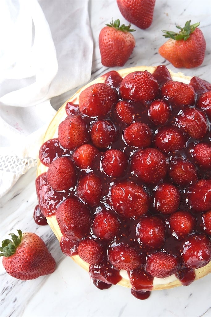 strawberry cheesecake with fresh strawberries and strawberry glaze